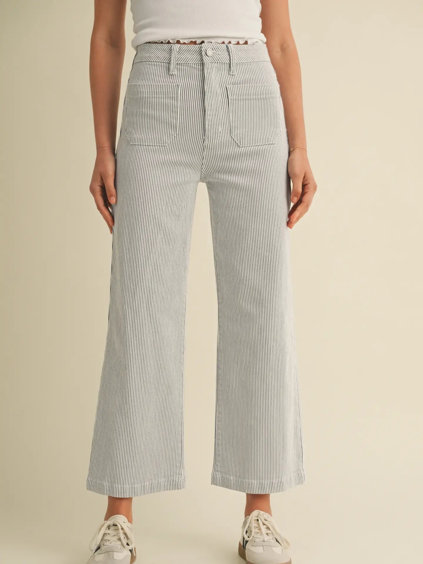 Light gray striped wide-leg pants.