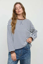 White and navy striped long sleeve top