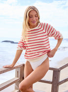 red striped open knit sweater 
