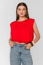 red cropped sleeveless blouse 