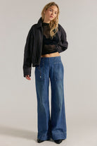 Medium wash wide leg pull on jeans
