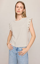 White top with grommets